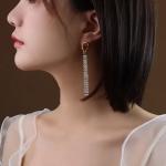 Boucle d'oreille longue en plaqué or 18k
